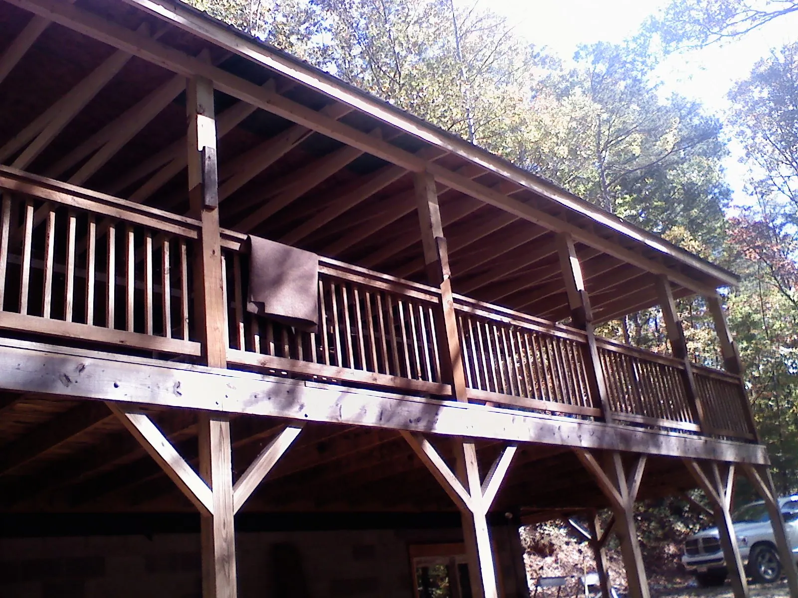 Timber framing under a new elevated porch and deck — Roof Leak Repair in Opp by Roofing Brothers